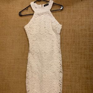 Lacey, high neck white dress.